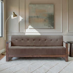 Homecrest 3-seater sofa in brown fabric with a dark walnut solid wood box frame and tufted backrest in a living room.