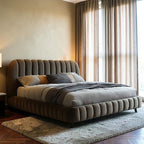 Homecrest luxurious brown velvet upholstered bed with a channel tufted headboard and footboard in a modern bedroom.