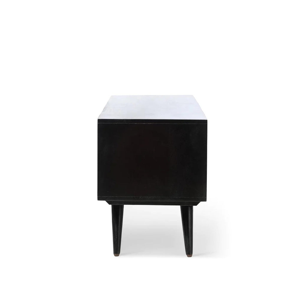 Homecrest Calder black solid mango wood media cabinet side view showing tapered legs and minimalist profile