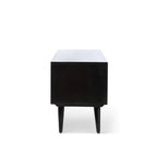 Homecrest Calder black solid mango wood media cabinet side view showing tapered legs and minimalist profile
