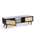 Homecrest Calder black media cabinet with rattan doors, gold handles, and open shelving on a white background.