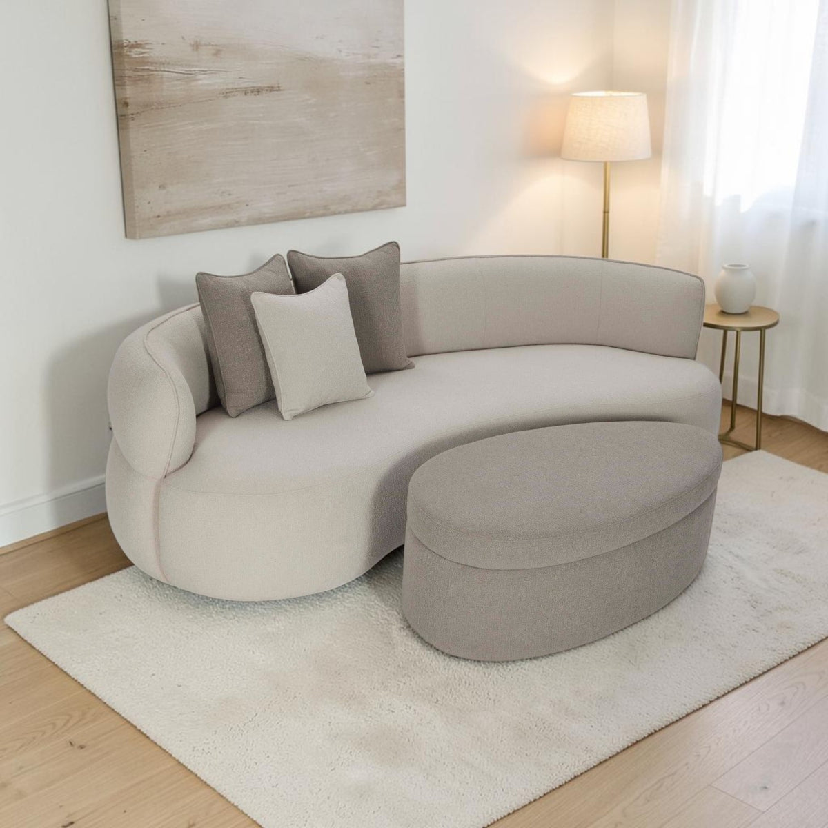 Homecrest Calla curved bean-shaped sofa and matching ottoman in two-tone cream and grey boucle fabric with teak legs.