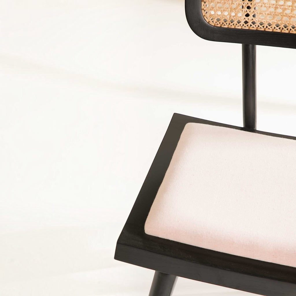 Homecrest mid-century modern dining chair in charcoal teak wood with a hand-woven rattan back and upholstered seat.