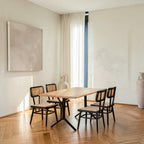 Homecrest mid-century modern dining chairs in charcoal black teak wood with hand-woven wicker backrests