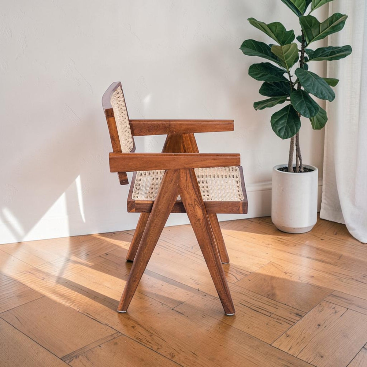 Homecrest Cavendish accent chair in natural teak wood with a woven rattan cane seat and distinctive A-frame legs.