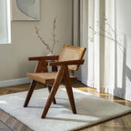 Homecrest Cavendish accent chair in natural teak wood with a woven rattan cane seat and distinctive A-frame leg design.