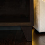 Homecrest Chalford bedside table featuring dark solid hardwood construction and a sturdy tapered leg detail.