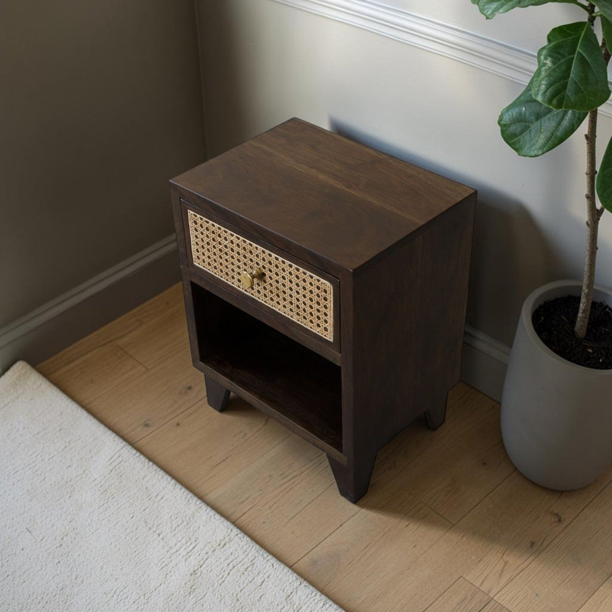 Homecrest Chalford bedside table in dark hardwood with a single drawer featuring hand-crafted cane rattan detailing.