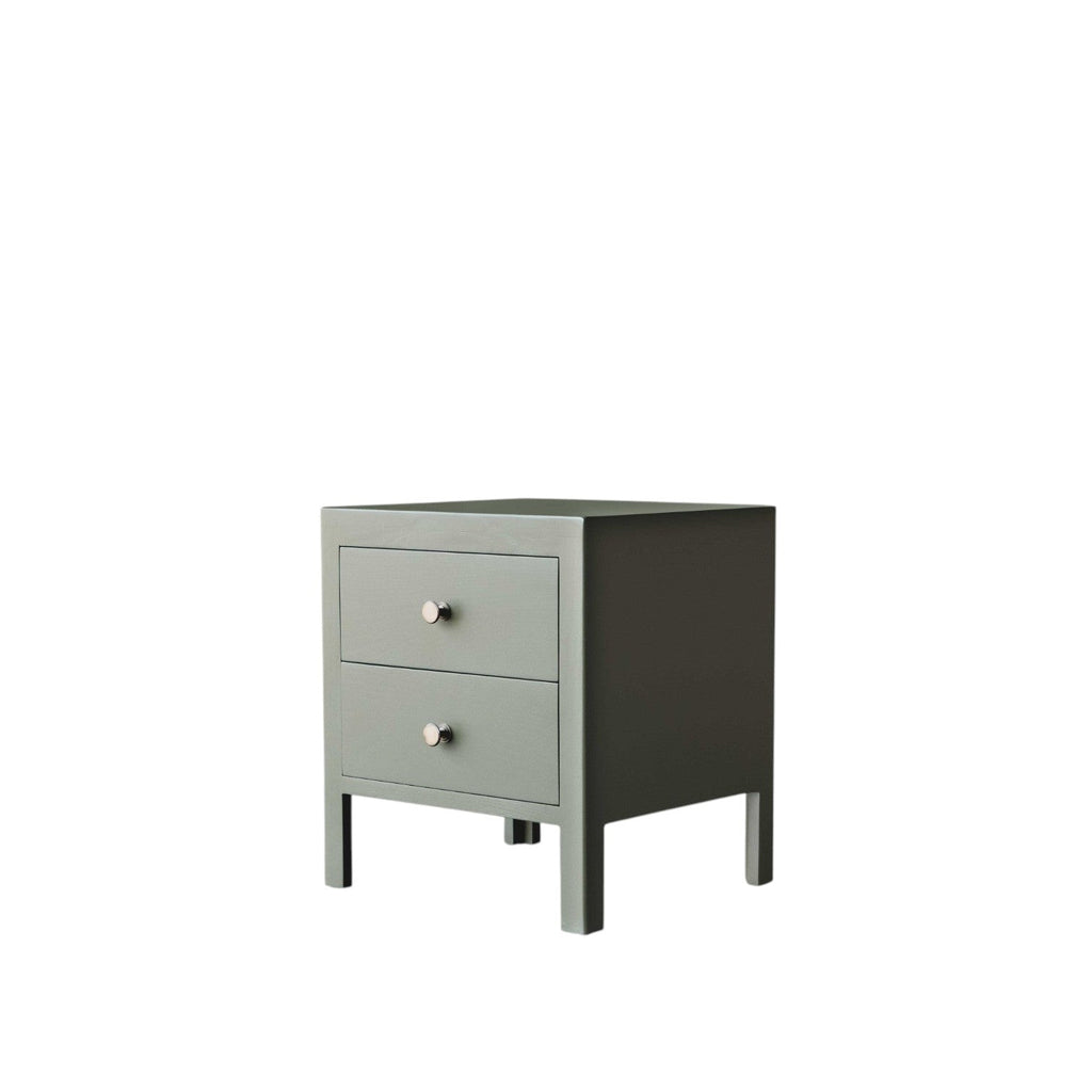 Homecrest Cranham bedside table in sage green hardwood with two drawers and silver knobs on a white background.