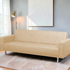 Homecrest Corbett beige leatherette 3-seater sofa bed with tufted backrest and solid wood frame in a modern living room