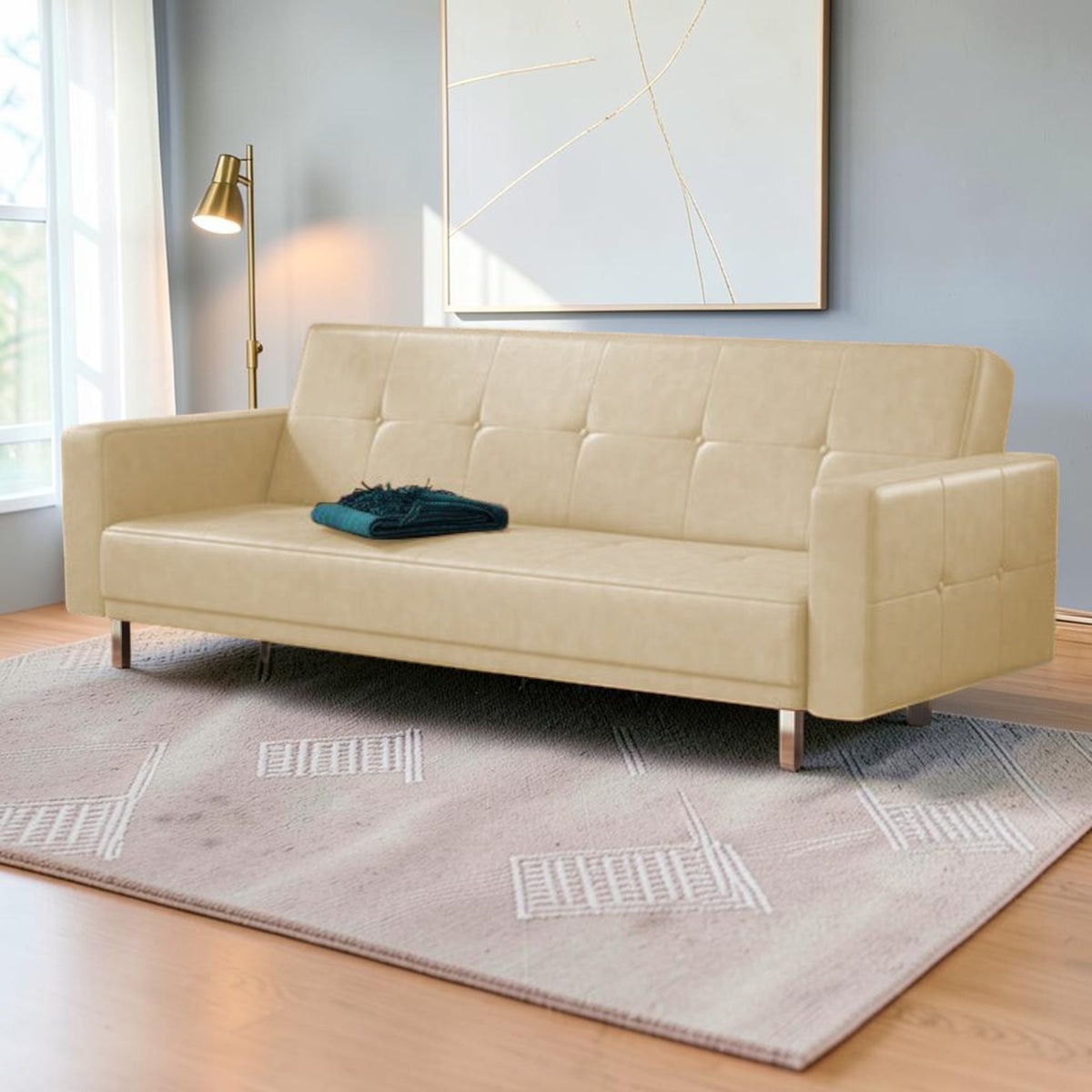 Homecrest Corbett beige leatherette 3-seater sofa bed with tufted detailing on a solid wood frame in a modern room.