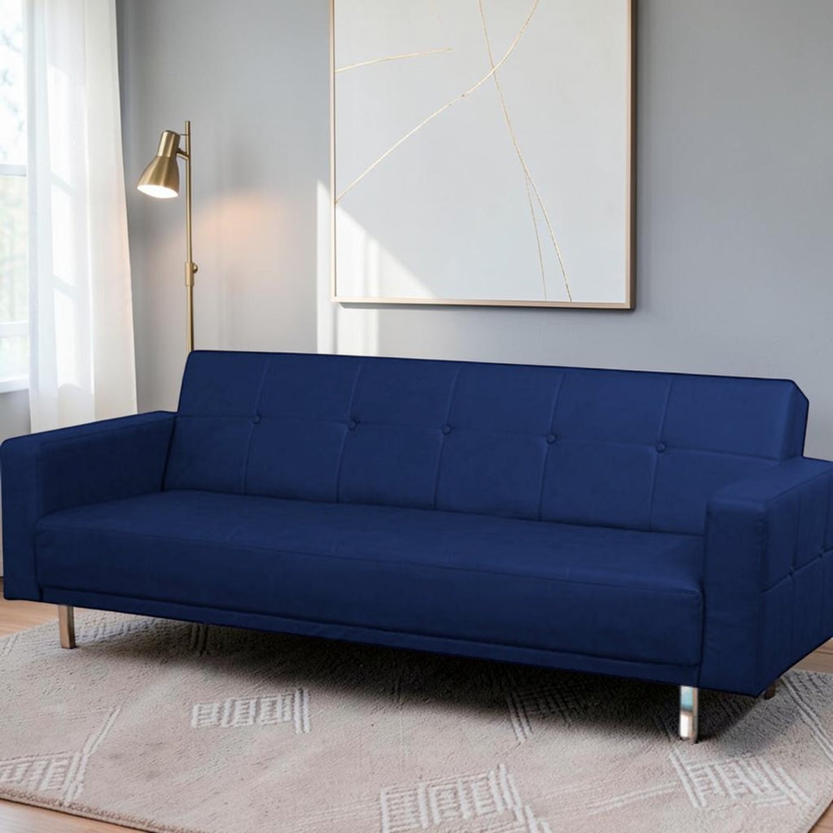 Homecrest Corbett navy blue leatherette three-seater sofa bed with tufted backrest and modern metal legs
