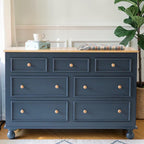 Homecrest Corin wide lowboy chest in blue with natural wood top, framed drawer fronts, and turned wooden knobs.