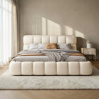 Homecrest cream velvet upholstered platform bed featuring a tufted headboard and footboard in a modern bedroom.
