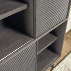 Homecrest Dara open mango wood bookshelf in dark brown with textured slatted cabinet doors and open shelving