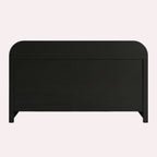 Homecrest dark solid wood bed frame with a rounded headboard and integrated storage in a minimalist style