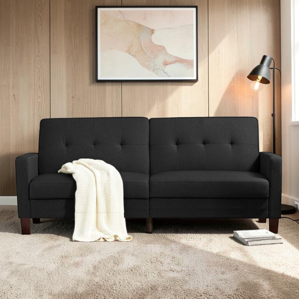 Homecrest Delaney black three-seater sofa bed with polyester upholstery and solid wood frame in a modern living room