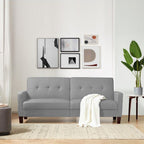 Homecrest Delaney light grey three-seater sofa bed with tufted polyester upholstery and solid wood legs in a living room