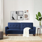 Homecrest Delaney navy blue three-seater sofa bed with tufted backrest and solid wood frame in a modern living room.