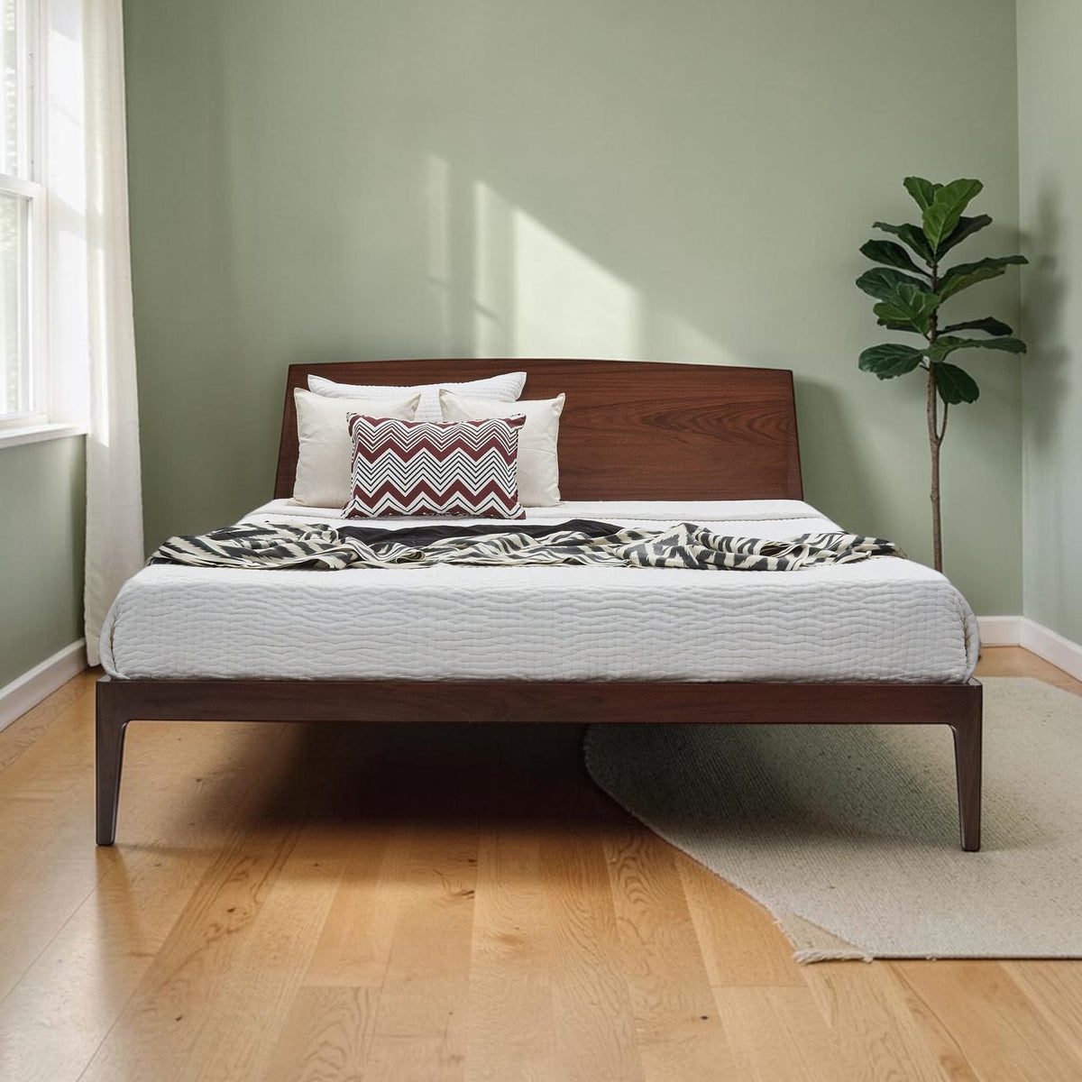 Homecrest Dunsford modern teakwood bed with a chamfered edge headboard in a minimalist bedroom setting