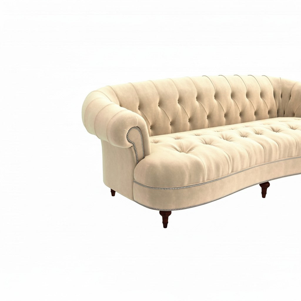 Homecrest Dunmore Chesterfield sofa in beige velvet with tufted back, rolled arms, and decorative nailhead trim.