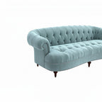 Homecrest Dunmore Chesterfield sofa in dusk blue velvet with button tufting, rolled arms, and silver nailhead trim.