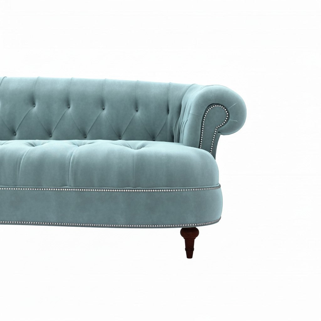 Homecrest Dunmore Chesterfield sofa in dusk blue velvet with button tufting, rolled arms, and silver nailhead trim.
