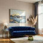Homecrest Dunmore Chesterfield sofa in indigo blue velvet with tufted back and silver nailhead trim in a living room.