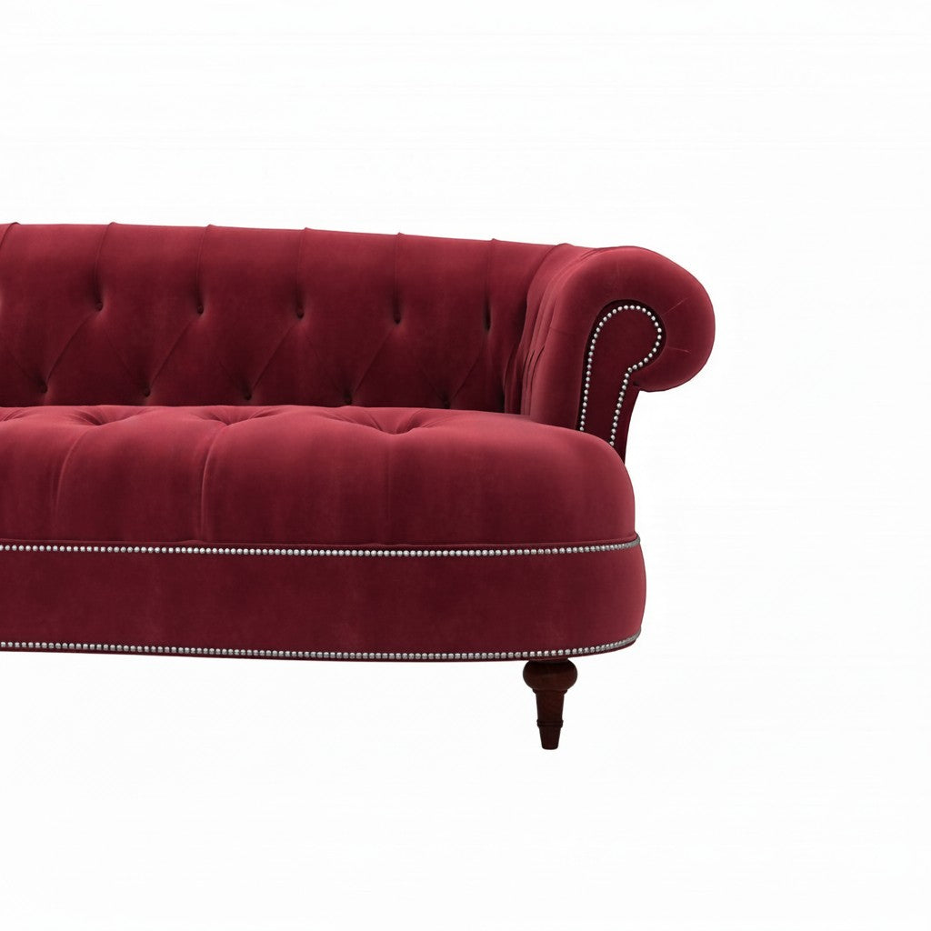 Homecrest Dunmore Chesterfield sofa in pomegranate red velvet with tufted back and silver nailhead trim detail