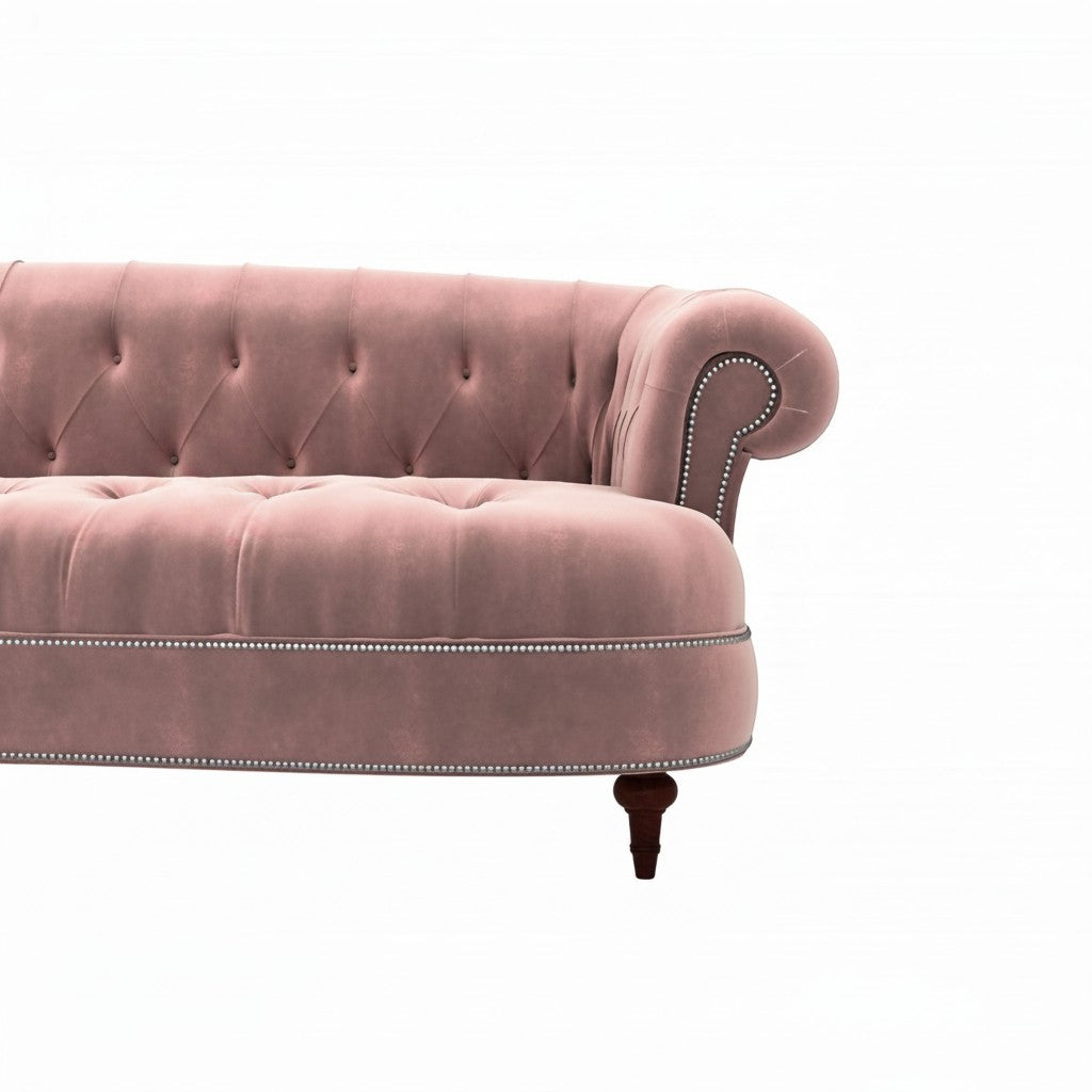 Homecrest Dunmore Chesterfield sofa in rose dust velvet with button tufting and silver nailhead trim on a white background
