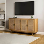 Homecrest Emsley sideboard in natural acacia wood with four cane-fronted doors, positioned under a wall-mounted TV.