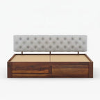 Homecrest Farleigh solid Sheesham wood platform bed featuring a tufted grey upholstered headboard and box storage.
