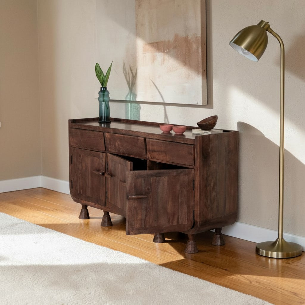 Homecrest Fairholm walnut acacia wood sideboard with contoured shutter doors in a contemporary living room setting