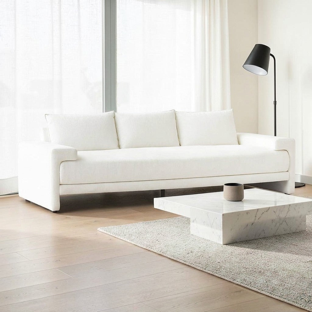 Homecrest Framlingham three-seater sofa in white cotton linen fabric with a modern minimalist design in a bright room.