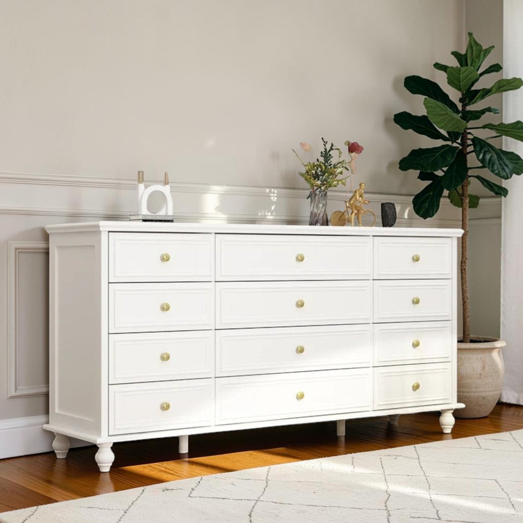 Homecrest Halstead white twelve-drawer chest made of sheesham wood with gold knobs on slim designer legs
