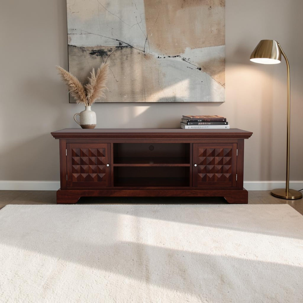 Homecrest Idris low-rise media unit in walnut-toned solid sheesham wood with geometric cabinet door detailing.