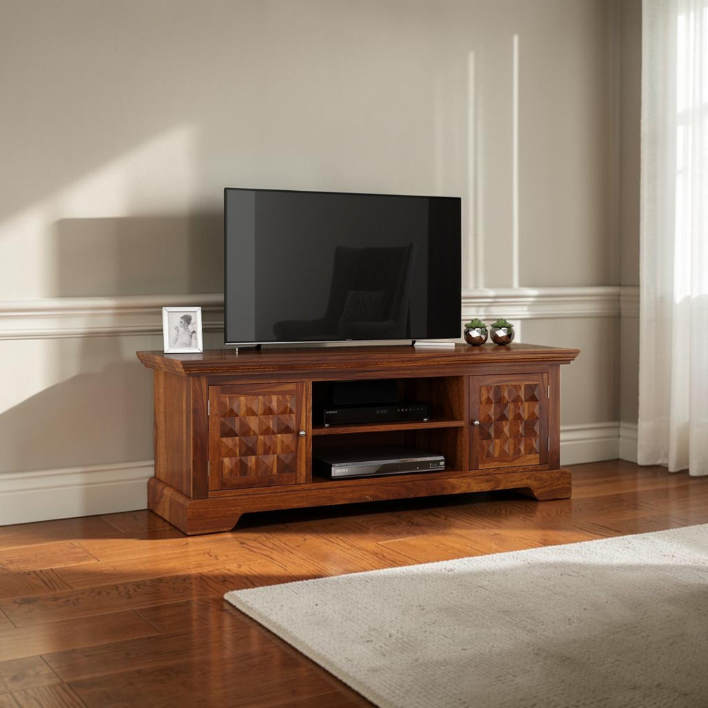 Homecrest Idris low-rise media unit in solid sheesham wood with a natural matte finish and geometric cabinet doors.