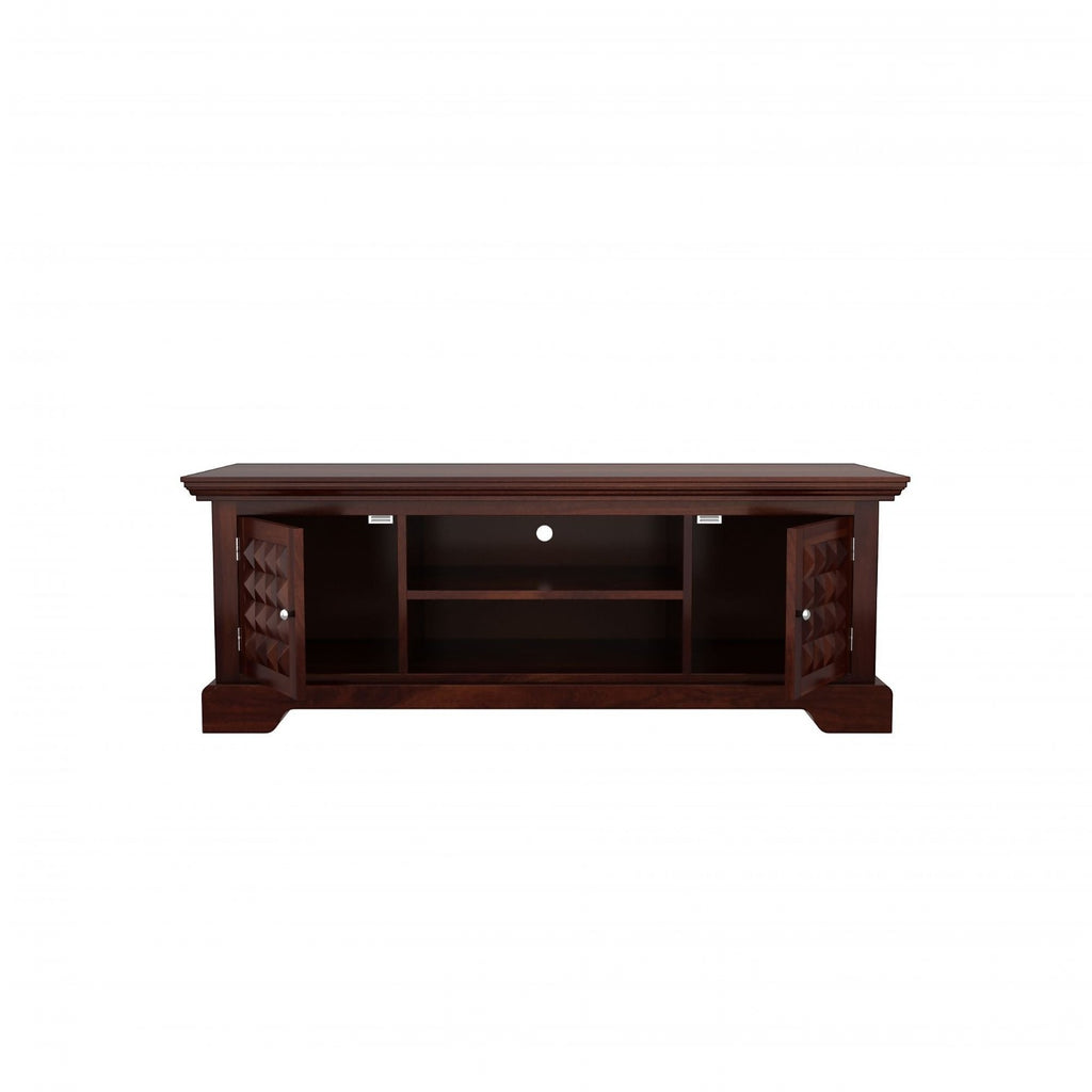 Homecrest Idris low-rise media unit in solid walnut-toned sheesham wood with carved cabinet doors and open shelving.