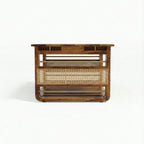 Homecrest Ilva rectangular coffee table made of dark Sheesham wood with natural rattan cane panel detailing