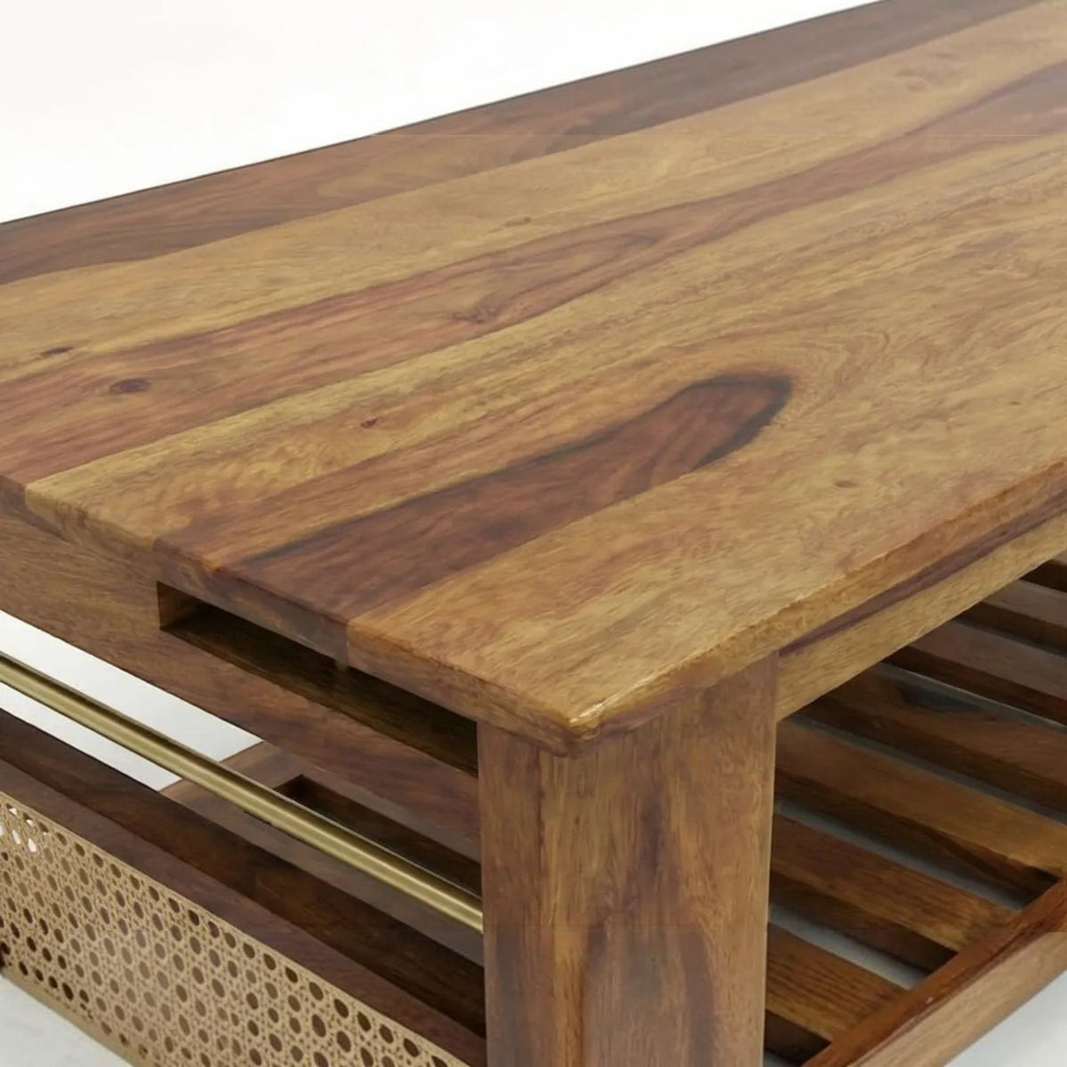 Homecrest Ilva rectangular coffee table made of rich brown Sheesham wood with natural rattan cane panel detailing.