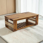 Homecrest Ilva rectangular coffee table made of warm-toned Sheesham wood with decorative rattan cane side panels.