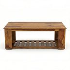 Homecrest Ilva rectangular coffee table made of natural Sheesham wood with a slatted lower shelf.
