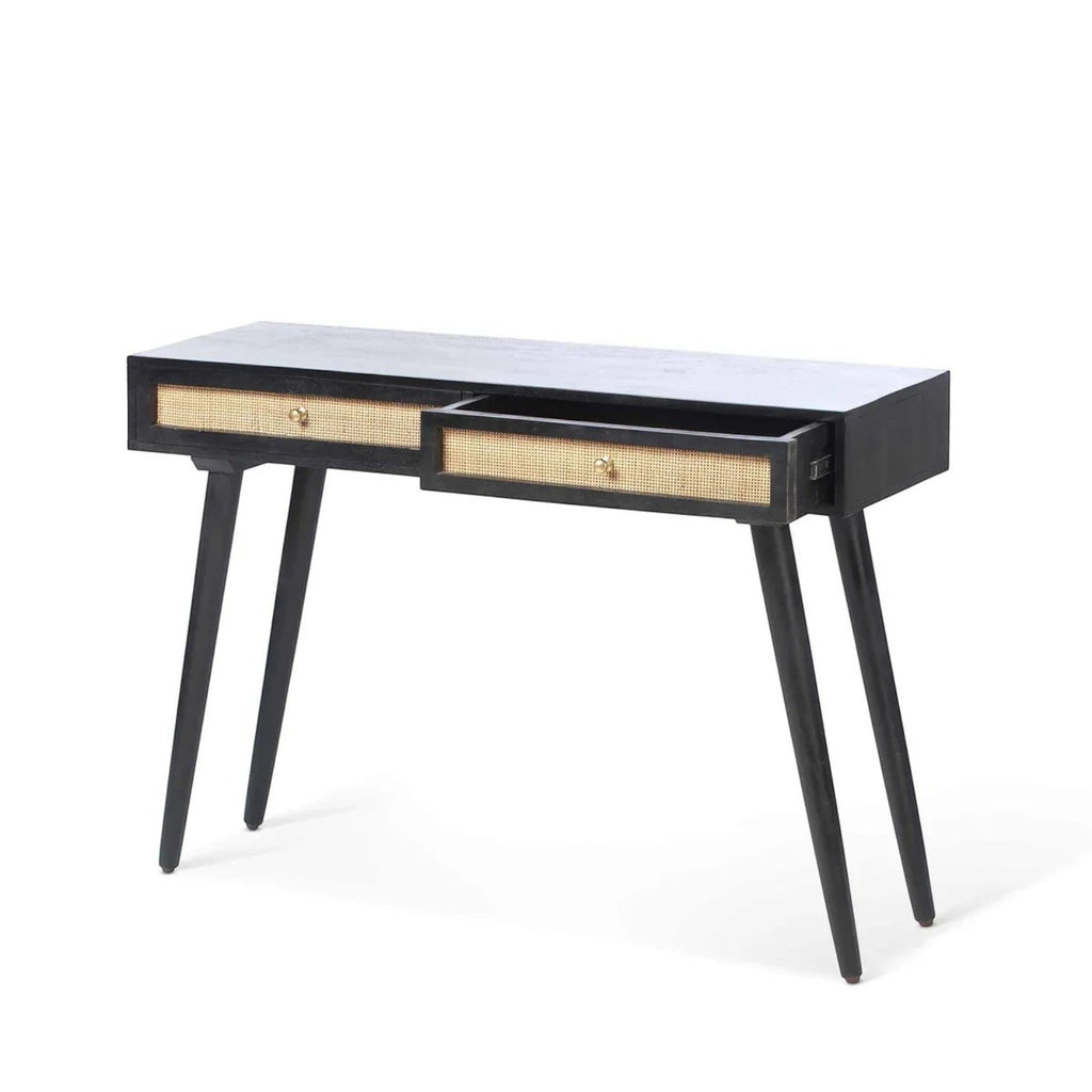 Homecrest Isla black console table with two drawers featuring woven rattan cane fronts and gold hardware