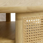 Homecrest Juno round coffee table in light natural wood with woven cane side panels and a lower circular shelf