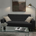 Homecrest Kesler dark grey polyester three-seater sofa cum bed with decorative patterned cushions in a living room.
