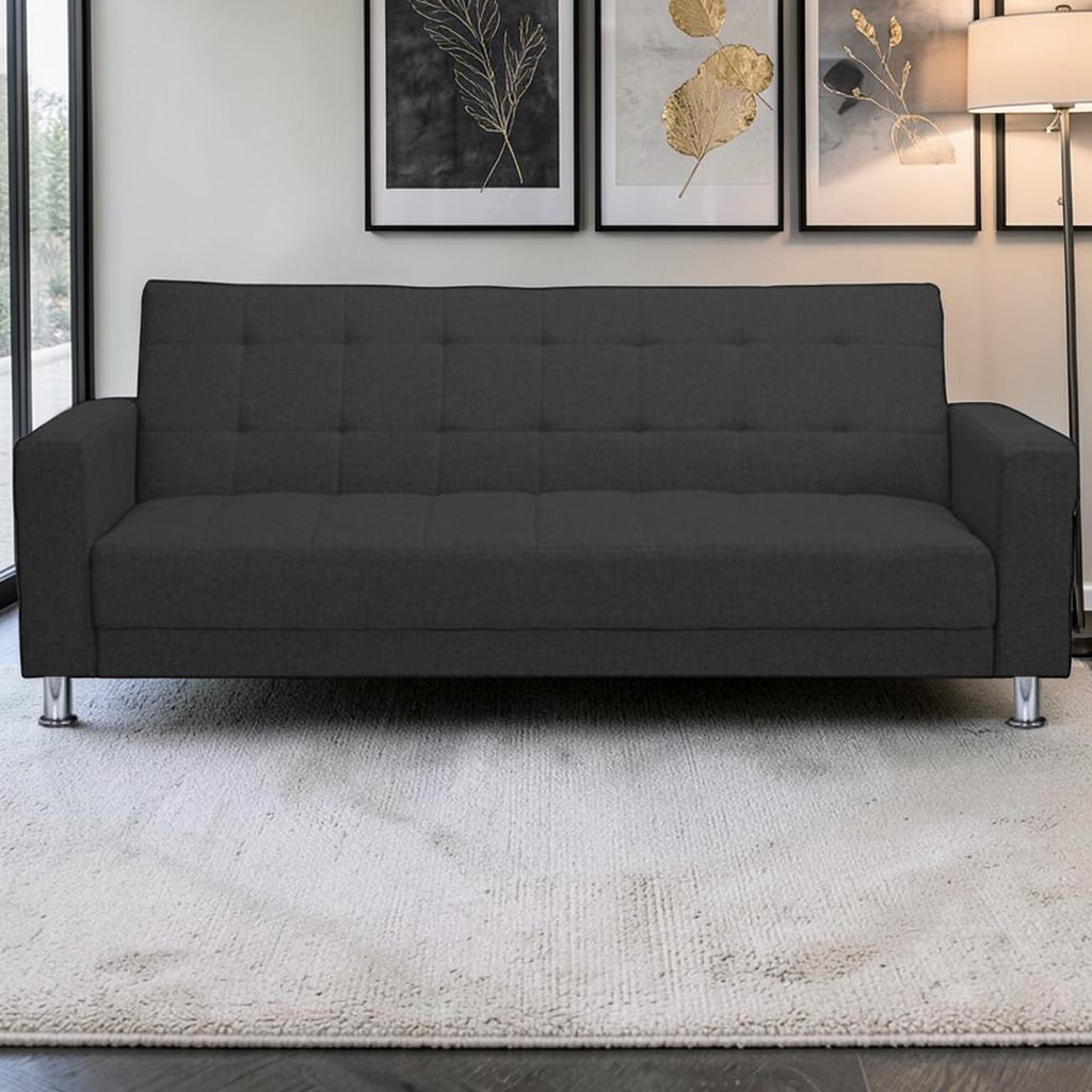 Homecrest Kesler dark grey polyester three-seater sofa cum bed with tufted back and chrome legs in a modern living room