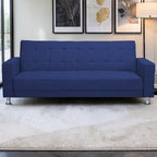 Homecrest Kesler navy blue polyester three-seater sofa bed with tufted backrest and chrome legs in a modern living room