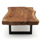 Homecrest Kestrel live edge coffee table with a natural solid wood slab top and black powder-coated metal frame.