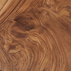 Close-up of the natural wood grain texture on a Homecrest Kestrel live edge coffee table top.