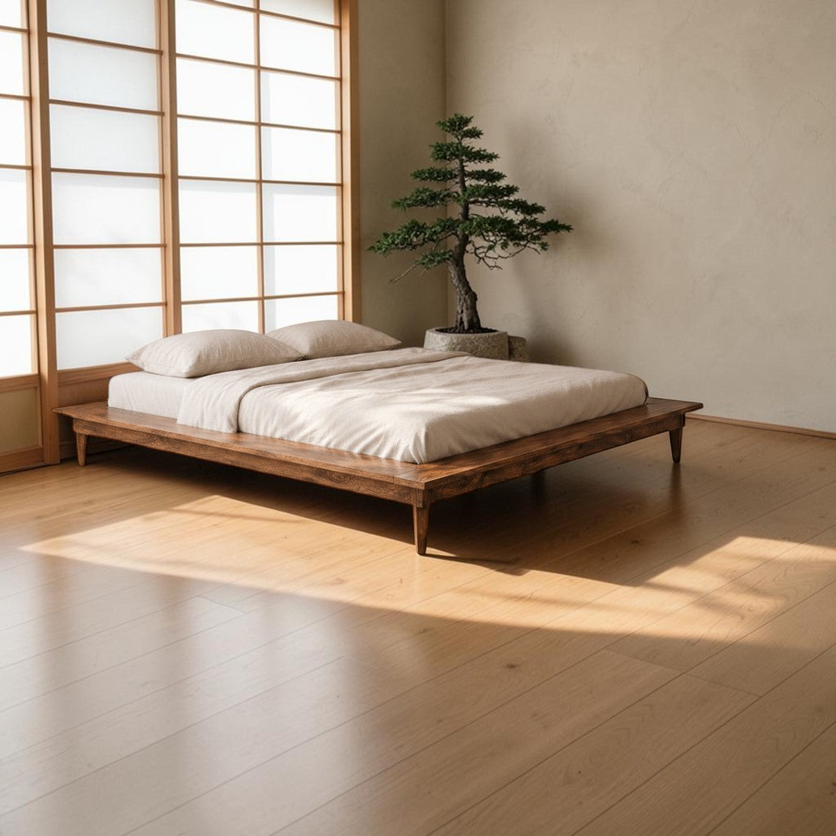 Homecrest Lyra low floor platform bed made of solid Sheesham wood with tapered legs in a minimalist bedroom setting.